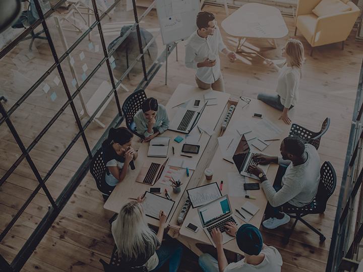 Nuestra filosofía. overhead office shot