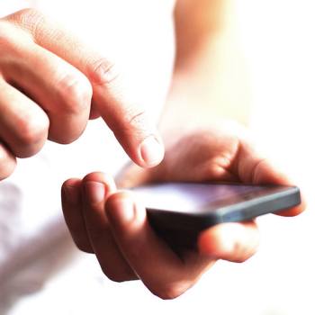 Declaracion de privacidad close up of hand holding a smartphone